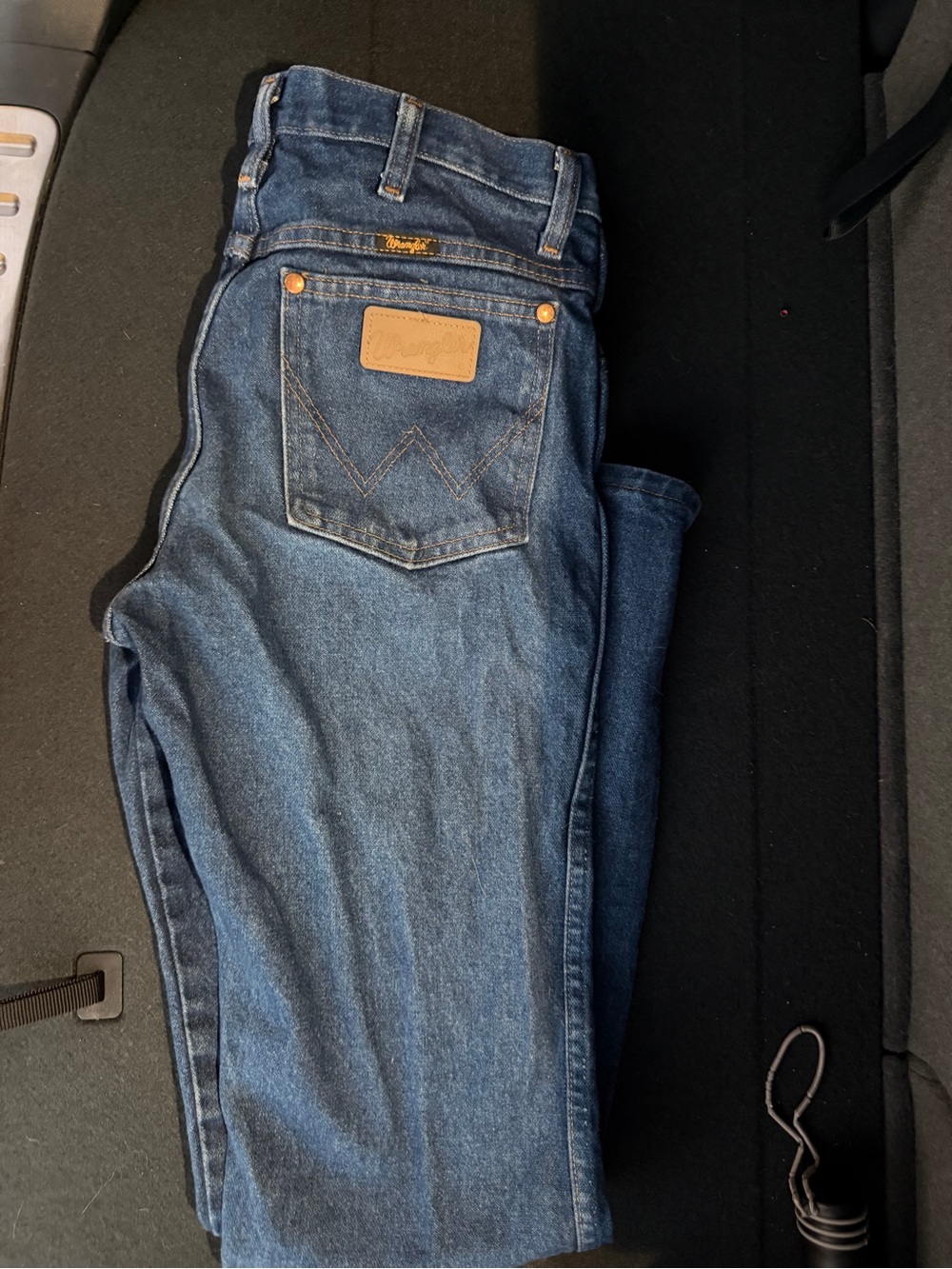 Wrangler Men’s Relaxed Fit Blue Denim Jeans with Tan Patch